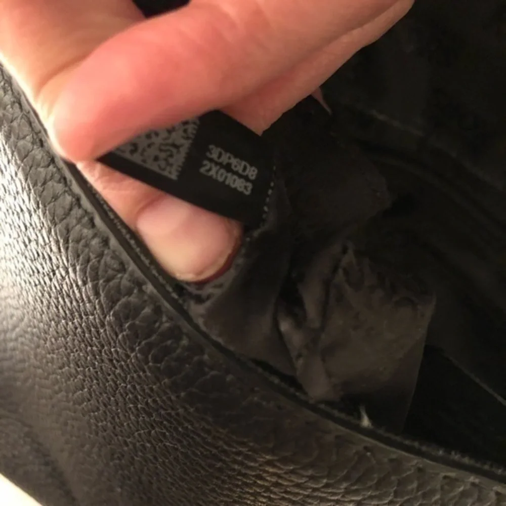 MICHAEL KORS pebbled leather top handle bag
